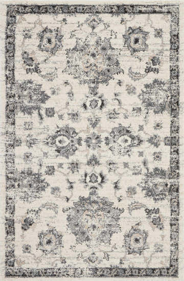Close-up of Nourison Fusion Cream Grey Vintage Area Rug featuring a floral pattern and distressed border.