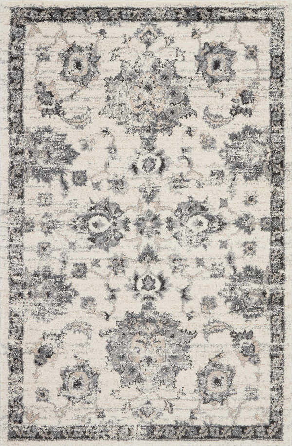 Close-up of Nourison Fusion Cream Grey Vintage Area Rug featuring a floral pattern and distressed border.