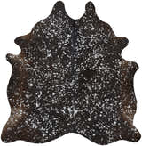 Close-up of Feizy Ellyse rug. Brown and silver cowhide rug with a speckled animal print and a soft, textured look. Design-Custom