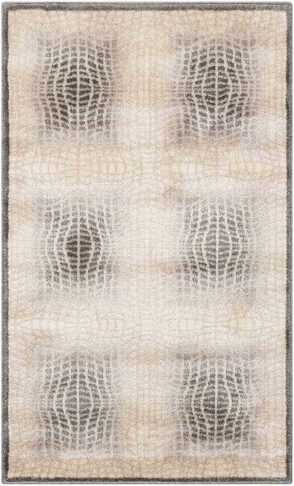 Close-up of Nourison Utopia Shell rug. Modern design with shell and gray geometric pattern. Soft texture.