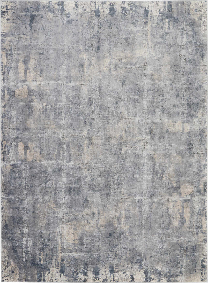 Close-up of the Nourison Rustic Textures Grey Beige area rug showing its distressed, mid-century modern design and textured surface.