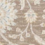 Close-up of Nourison Isla Mocha vintage rug texture. Light brown, cream, and subtle blue floral pattern. High pile.