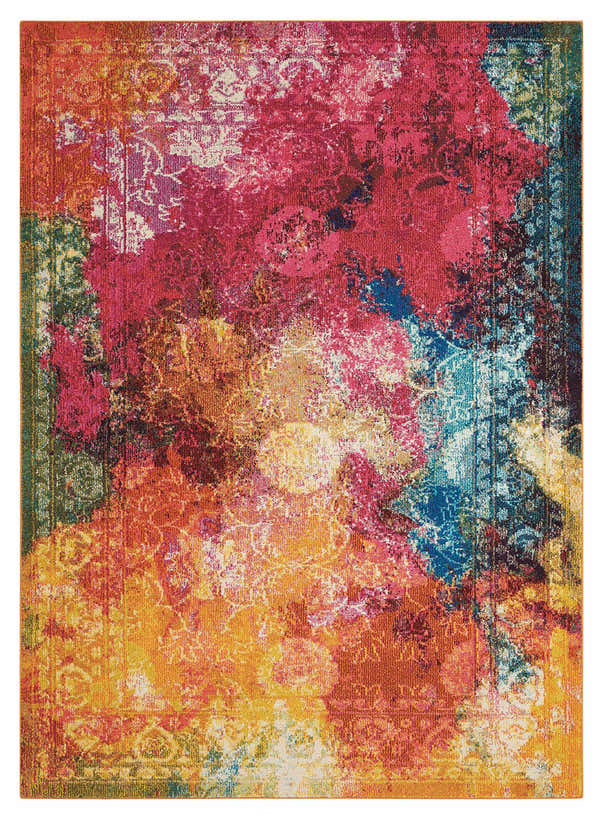 Close-up of Nourison Celestial Seaglass rug. Bohemian style with pink, orange, yellow, and blue abstract floral patterns.