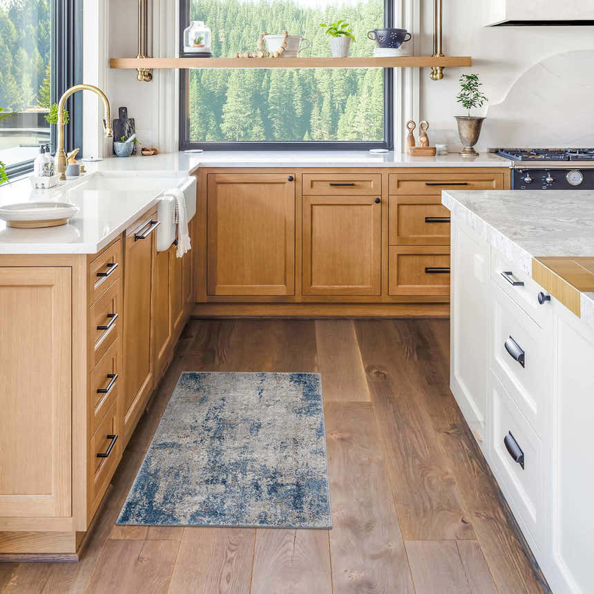 Light wood kitchen with Sapcote Textured Luxe Area Rug in blue and beige near the sink. Roomscene-Rectangle