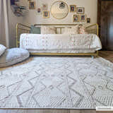 Kids room scene with a beige Armen Area Rug, gold daybed, and gallery wall. Farmhouse style. Roomscene-Rectangle