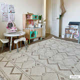 Kids room with Armen Area Rug in beige and gray, complementing a play kitchen and dollhouse. Roomscene-Rectangle