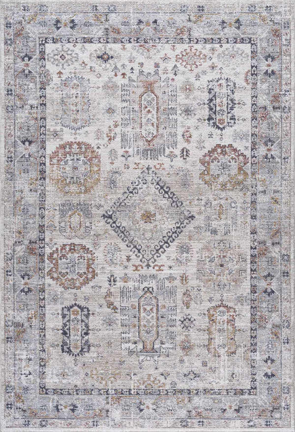 Close-up of Kamau Area Rug, light gray and natural gray polyester with a farmhouse-style geometric pattern. Design-Rectangle-575