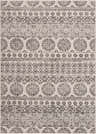 Close-up of the Warroad Area Rug. Charcoal and light beige rug with a traditional, bohemian-inspired medallion pattern. Design-Rectangle-5373