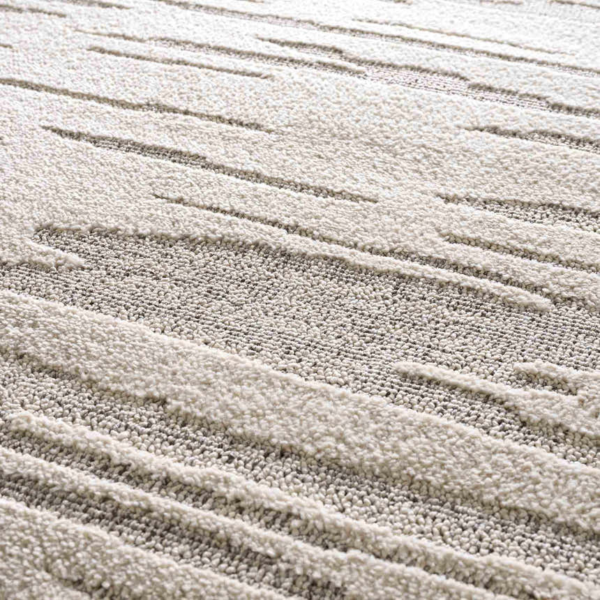 Close up of the Lave Bone Area Rug showing its textured, tone on tone, contemporary design. Texture