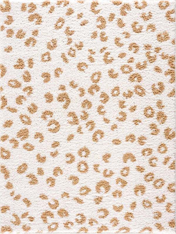 Close-up of the Altin Area Rug. White shag rug with a yellow animal print pattern. Contemporary style. Design-Rectangle-5373