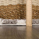 Close-up of the plush Kieu Taupe Checkered Rug showing gray and white checkered pattern and texture with a ruler. Pile