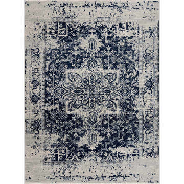 Close-up of the New Limestone Area Rug. Machine-woven rug in medium gray and navy with a traditional, distressed pattern. Design-Rectangle