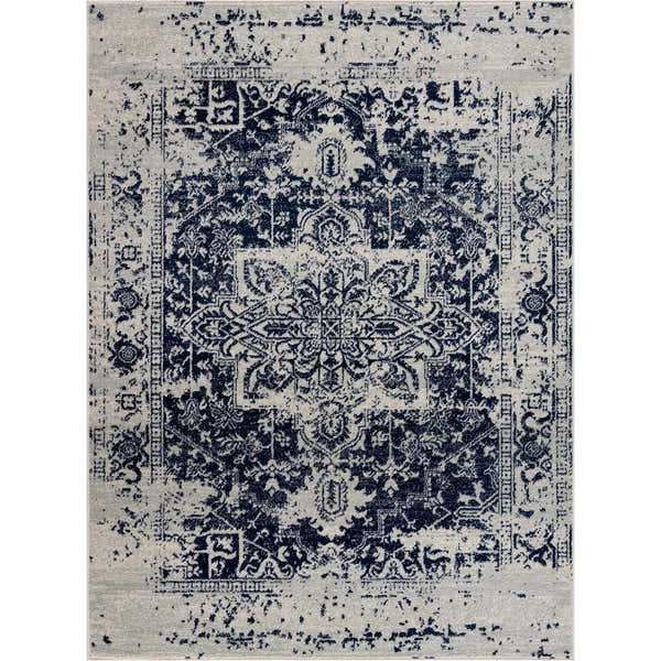 Close-up of the New Limestone Area Rug. Machine-woven rug in medium gray and navy with a traditional, distressed pattern. Design-Rectangle