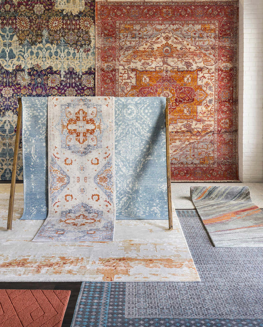 Rug display featuring Mossyrock Premium Rug in brick red, camel, cream, light gray, mustard, and tan colors. Contemporary style. Styleshot