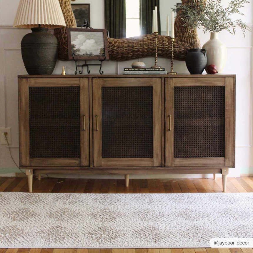 Styled Broox Beige area rug in a transitional room with a wooden cabinet and hardwood floors. Roomscene-Runner