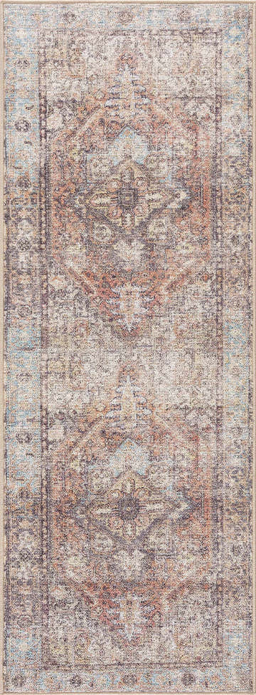 Close-up of the Beck Peach Washable Area Rug. Features traditional oriental design in beige, peach, blue, and brown tones. Design-Runner
