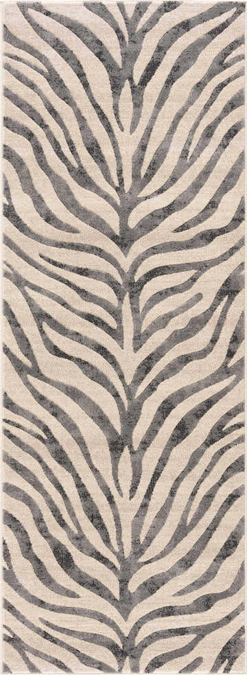 Close-up of the Gray Ecorse Zebra Print Area Rug, featuring a black, charcoal and light beige animal pattern. Design-Runner-2773