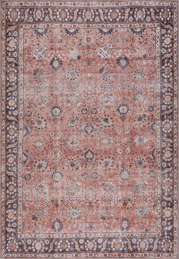Close-up of the Ganyangan Red Washable Rug with a traditional floral pattern in brick red, blue, and beige. Design-Rectangle-5373