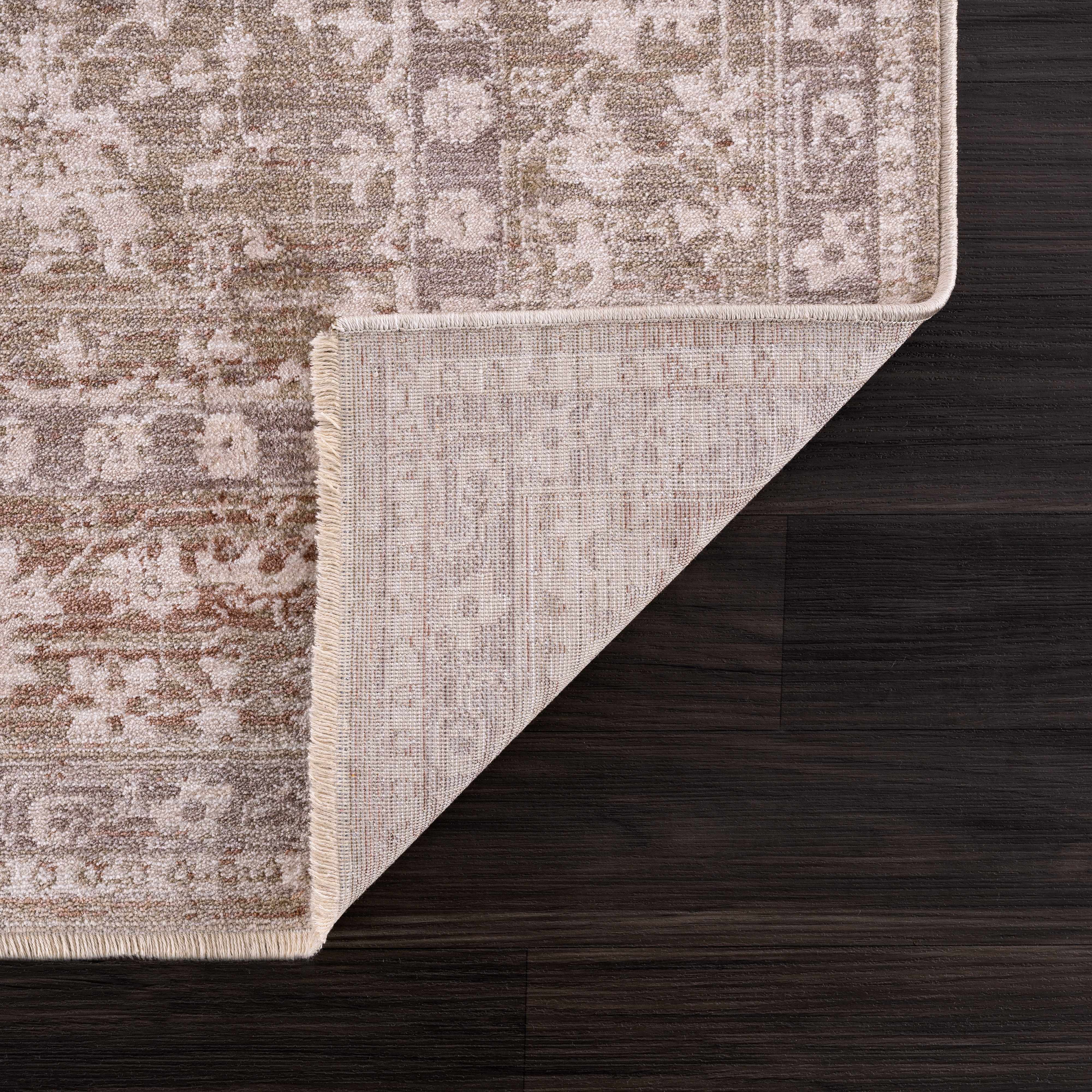 Folded section of Kaongkod Area Rug - Clearance, displaying material thickness and weave. Traditional Area Rug Backing  