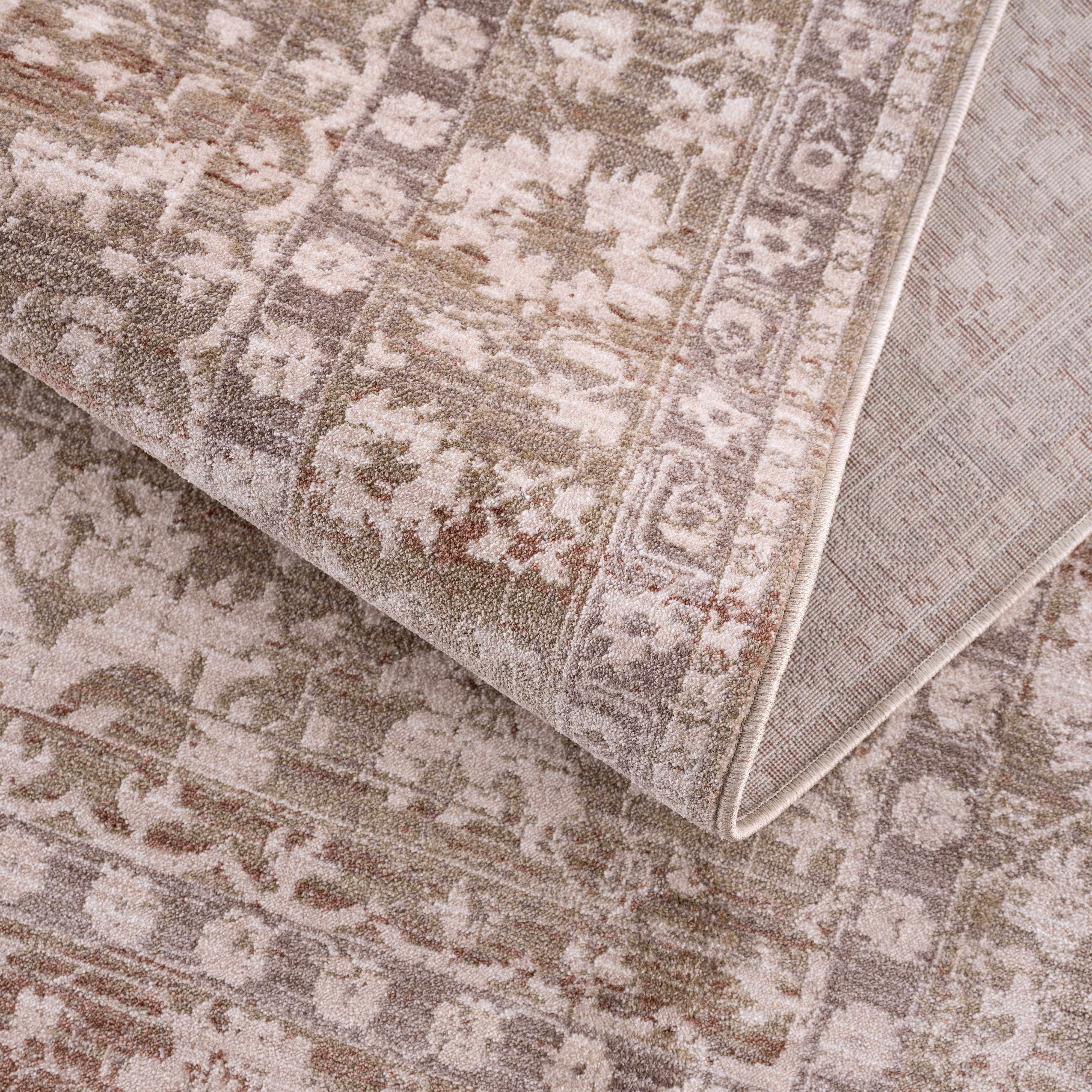 Folded section of Kaongkod Area Rug - Clearance, displaying material thickness and weave. Traditional Area Rug Backing  