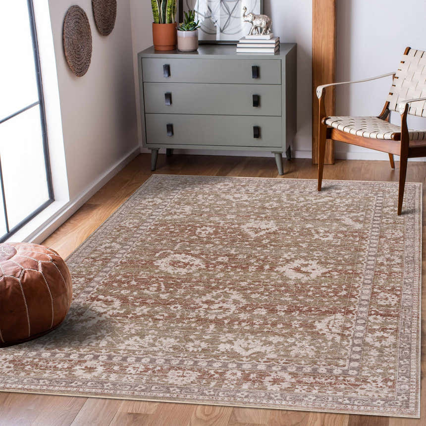 Farmhouse style room with Kaongkod Area Rug in dusty pink, ivory, and brown. Gray dresser, leather pouf, and woven chair. Roomscene-Rectangle