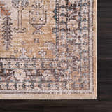 Close-up of the Darla Area Rug showing its bone, clay, and taupe traditional pattern and soft texture on dark wood flooring. Swatch
