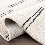 Riad Black Striped White Rug with Tassels