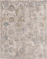 Close-up of the Alroy Textured Rug. Machine-woven polyester rug in gray, brown, and nutmeg with a traditional, distressed design. Design-Rectangle-575