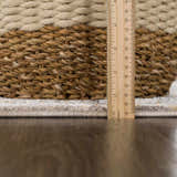 Close up of the Alroy Textured Rug showing the pile height with a ruler and a basket. Pile
