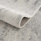 Close-up of the Tigrima Ivory 2319 area rug showing its gray and ivory contemporary pattern and soft, textured polypropylene weave. Fold
