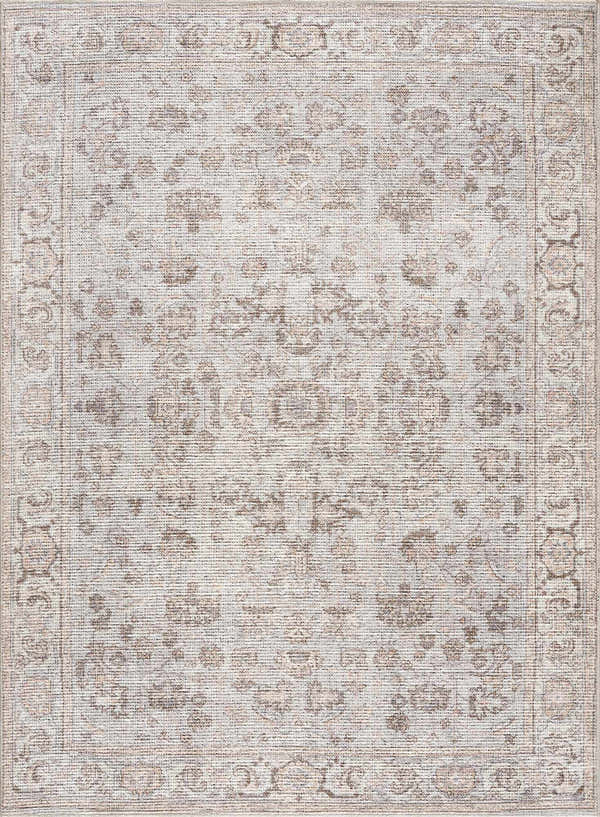 Close-up of the Niran Area Rug, a traditional vintage style rug with floral patterns in gray and brown tones. Design-Rectangle-537