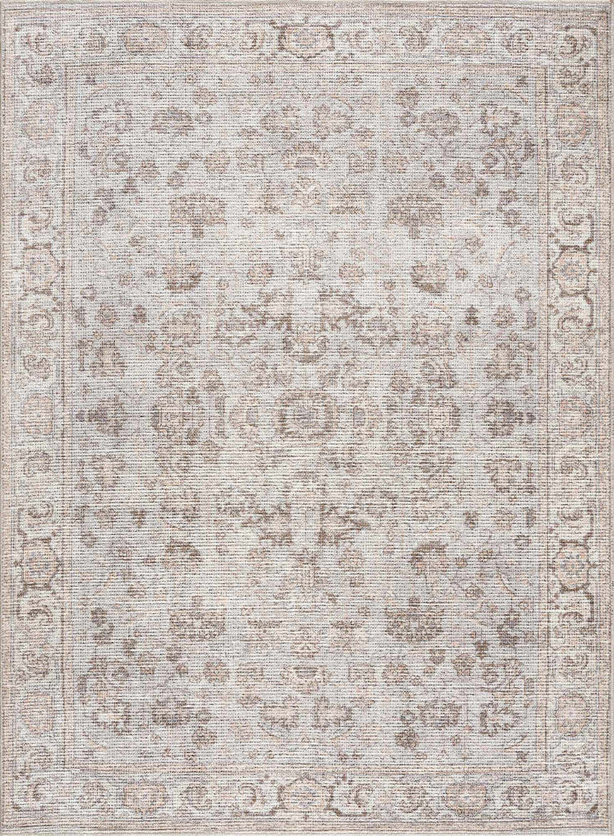 Close-up of the Niran Area Rug, a traditional vintage style rug with floral patterns in gray and brown tones. Design-Rectangle-537