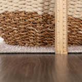 Close-up of the textured edge and pile height of the Melor Area Rug, next to a ruler for scale. Pile