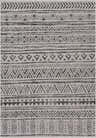 Close-up of the Catrine Indoor & Outdoor Rug, showcasing its black and white bohemian-inspired geometric pattern and woven texture. Design-Rectangle-5373