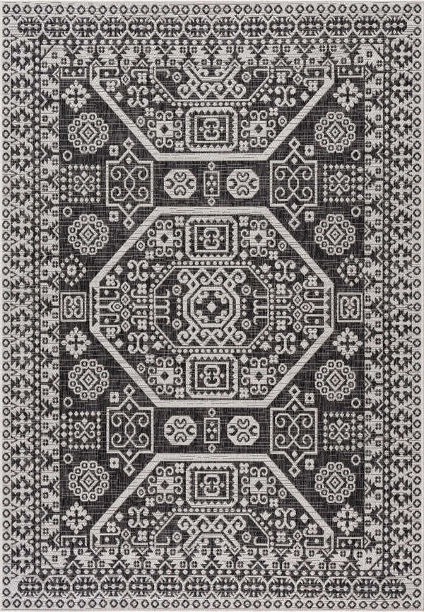 Close-up of the Kingscliff Nordic Rug, showcasing its black and off-white Bohemian-inspired geometric pattern. Design-Rectangle-5373