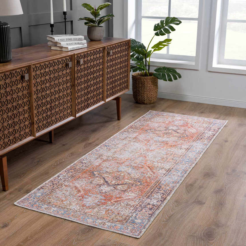 Entryway scene with a vintage Eira Distressed Washable Rug runner in orange, blue, and off white colors. Roomscene-Runner