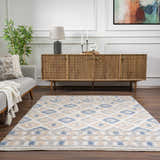 Living room scene with Eivin Pink & Blue Area Rug. Bohemian rug with light blue and pink diamond pattern on a shag texture. Roomscene-Rectangle