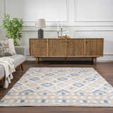 Living room with Eivin Pink & Blue Area Rug, gray sofa, and wooden console table. Bohemian style. Roomscene-Rectangle
