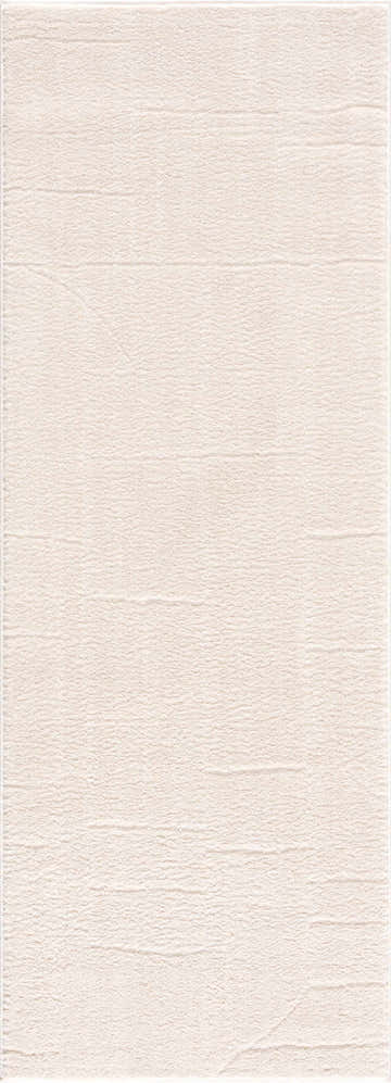 Close-up of the Keats Ivory Area Rug showing its subtle texture and soft beige, ivory, and rose cream colors. Design-Runner-2773