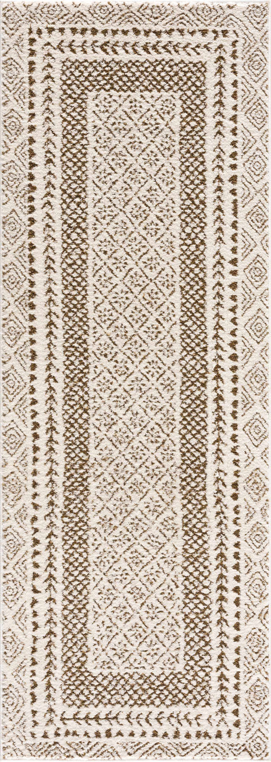 Close-up of the Julio Scandi Boho Area Rug. Brown geometric patterns on a beige, machine woven pile. Design-Runner-2773