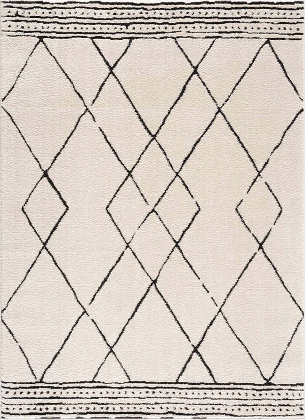 Close-up of the Keone Black & White rug. Features a geometric diamond pattern and black striped border on a beige base. Design-Rectangle-537