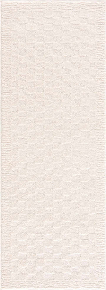 Close-up of the Leryn Ivory Checkered Area Rug, showcasing its beige and ivory geometric pattern and soft, textured weave. Design-Runner-2773