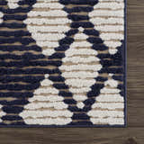 Close-up of the Enhaut 3D Outdoor Area Rug, bone and cloud gray geometric pattern, machine woven texture. Swatch
