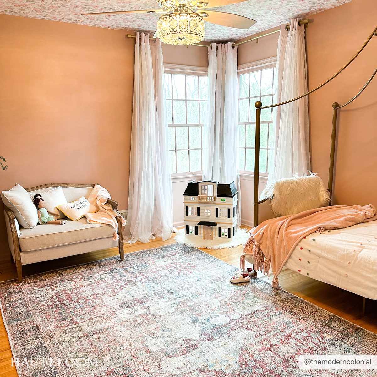 Kids bedroom with Rust Elki Vintage Medallion Washable Area Rug, pink walls, white curtains, and dollhouse. Roomscene-Rectangle