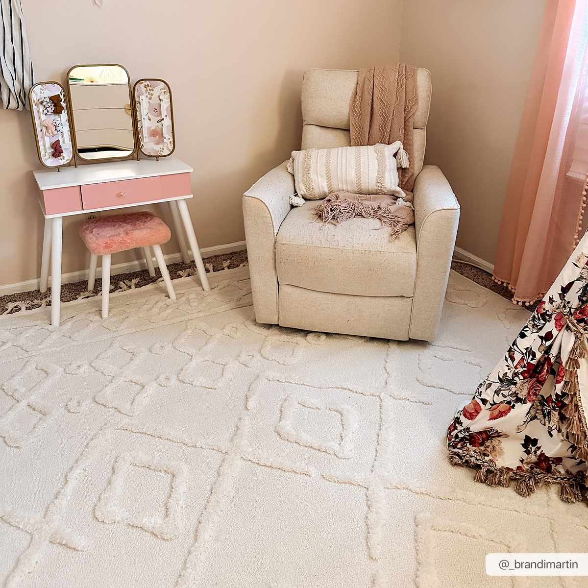 Kids room with a bone Gyundyukoru Area Rug, cream chair, pink vanity, and floral teepee. Soft, neutral tones create a cozy mood. Roomscene-Rectangle