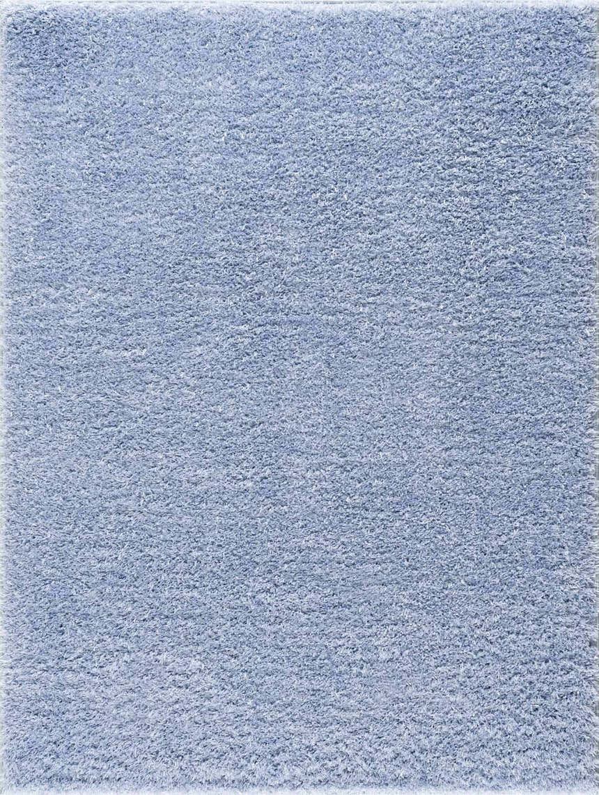 Close-up of the Faina Solid Aqua Shag Washable Area Rug, showing its soft, plush texture and consistent aqua color. Design-Rectangle-46