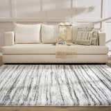 Living room scene with a cream sofa and the gray and white Lotta Area Rug. Roomscene-Rectangle