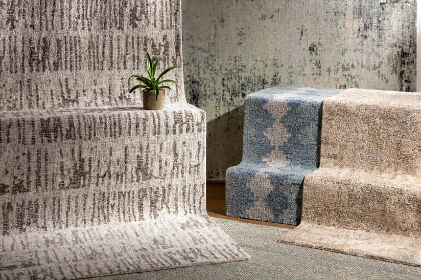 Close-up of the Namboongan Area Rug showing its charcoal, cream, and gray contemporary pattern and hand-tufted texture. Styleshot