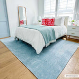 Isako Blue Solid Washable Area Rug - Clearance
