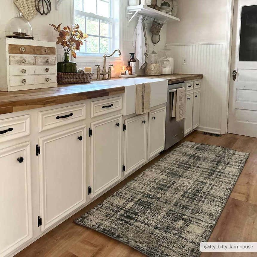 Farmhouse kitchen with white cabinets and wood counters featuring the Kenny Area Rug runner. Roomscene-Runner